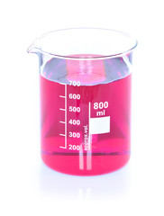 Chemical beaker with red chemicals dissolved in water