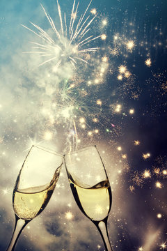 Glasses With Champagne Against Fireworks