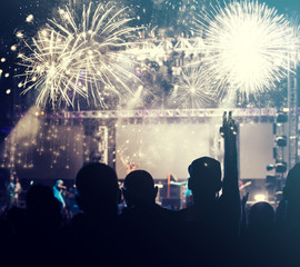 Cheering crowd and fireworks - New Year concept