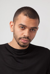 Obraz premium unretouched close up portrait of attractive black young man