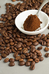 ground coffee on the teaspoon closeup