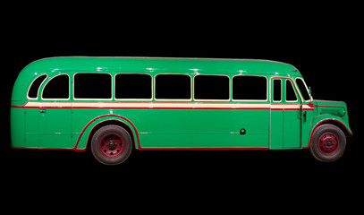 Old retro green bus. Isolated on black background. © M-Production