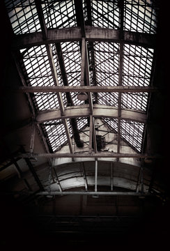 Abandoned rooftop of industrial factory interior.