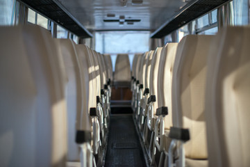 Empty interior of the bus at morning.