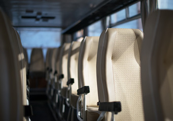 Empty interior of the bus at morning.