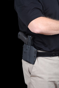 Man With Gun In Holster On His Hip 