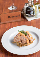 Sliced turkey meat and cooked cabbage
