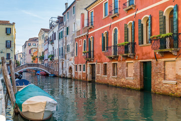 Streetview with bridge and old buildings in Venice Italy.