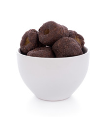 Crunchy corn chocolate snacks on a white background