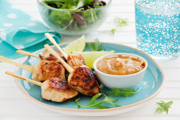 Chicken saute with peanut sauce.