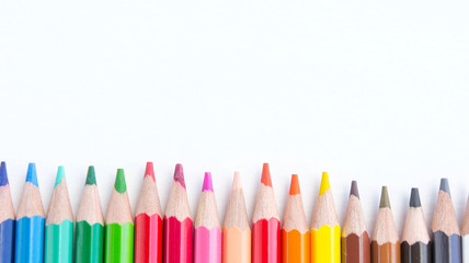 Naklejka premium pencils color on white background, with copy space