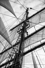 Obraz premium Vintage style picture of beautiful sail boat details. Rope, hull