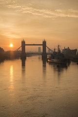 Obraz na płótnie Canvas Golden Autumn sunrise over Tower Bridge in London.