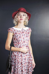 cute young blond woman in a hat