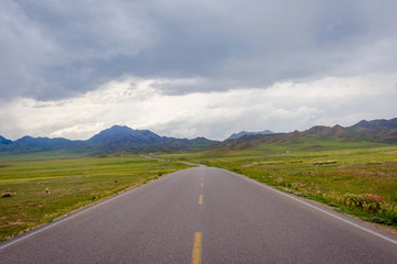 Road thru the mountains at Sayram lake, Xinjiang Uyghur autonomous region, China