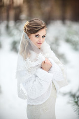 Winter, portrait of beautiful bride at winter wedding day