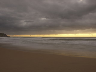 Fototapeta na wymiar Amanecer en la playa
