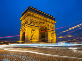 Fototapeta na wymiar The Triumphal Arch at night in Paris, France