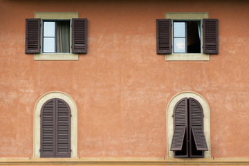 Tuscany windows with brown shutters