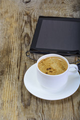 Fototapeta na wymiar Workplace businessman: laptop, coffee and sunglasses