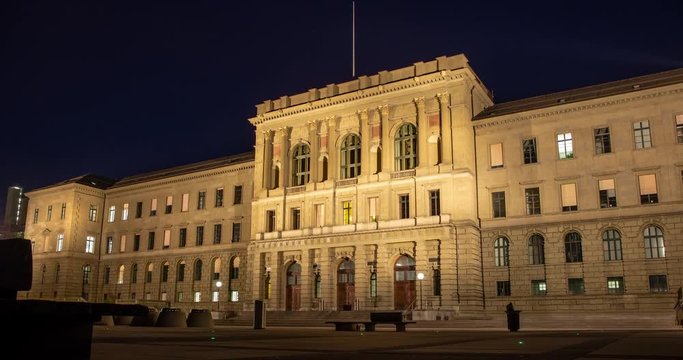 Zurich, Switzerland - main building of ETH of Zurich at night - Timelapse with zoom in