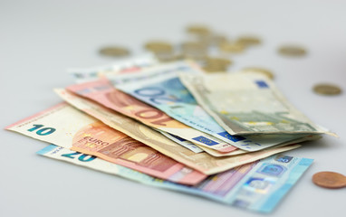 Money scattered on a table