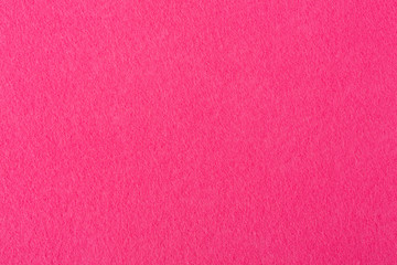 Macro photo of red felt texture.