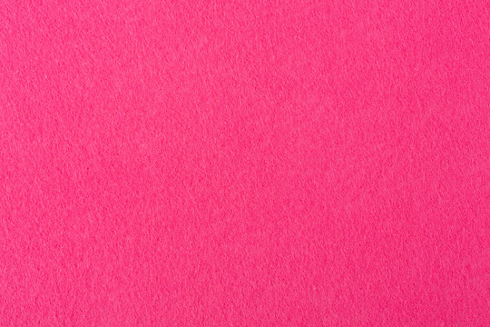 Macro photo of red felt texture.