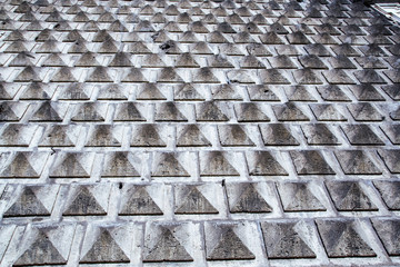 Bugnato on the facade of the Gesù church in Naples, Italy 