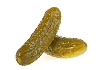 Pickled cucumbers on white background