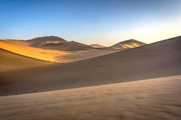 Fototapeta na wymiar Colorful sand dunes in Gobi desert at sunset, Dunhuang, China