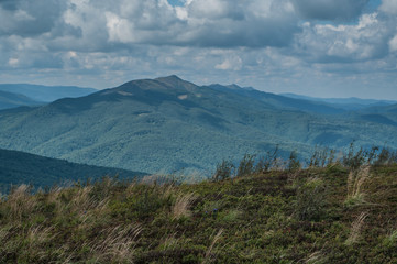 Mountain view, cloudy weather, interesting hills in the background
