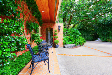 Brick paved walkway leading to the front yard. Luxury house exterior. Northwest, USA