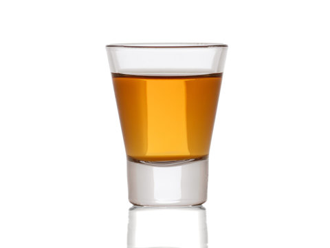 A small shot glass of delicious  whiskey