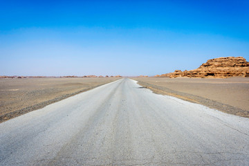 Road straight ahead to Dunhuang Yardang National Geopark, Gobi desert, China