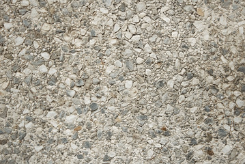 Old grey stone wall background texture