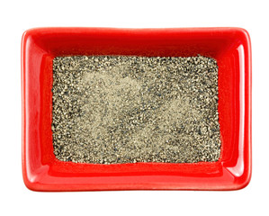 Peppercorns in a bowl. Isolated