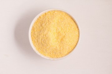 Corn Couscous into a bowl. Cucus