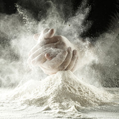 men and hands and flour 