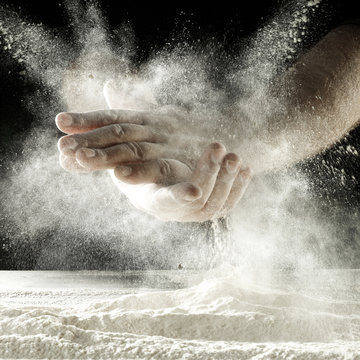 men and hands and flour 