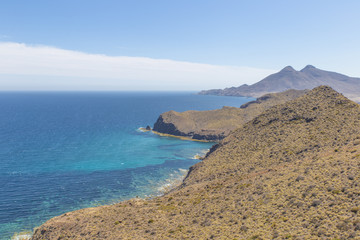 Beautiful landscape seen from La Amatista viewpoint in Cabo de Gata Nijar Natural Park, Almeria, Andalusia, Spain. beauty coastscape of Mountains at Mediterranean sea in Protected area 