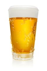 Fotobehang Glass of beer on white © Kuzmick