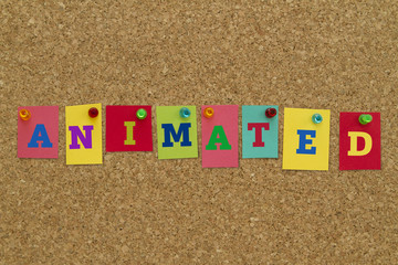 Animated word written on colorful sticky notes pinned on cork board.