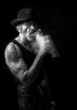 Smoking man portrait in monochrome