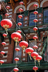 Chinese festival lanterns hanging from building in San Francisco's Chinatown.