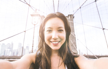 Taking selfie on the brooklyn bridge