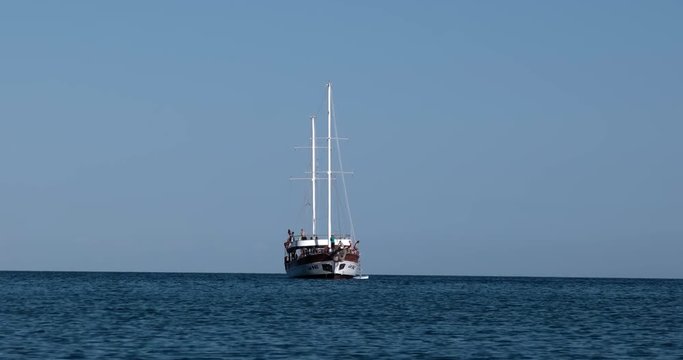 Gulet Yacht With Tourists Anchored in the Bay of Mediterranean Sea