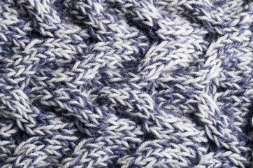 Close-up of knitted cloth with raised tracery