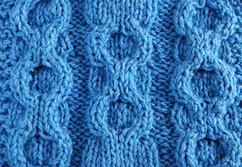 Close-up of knitted cloth with raised tracery