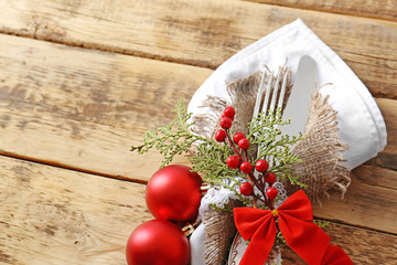 Beautiful Christmas table setting on wooden background